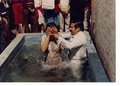 Hno Cutberto Briseño, bautizando.png