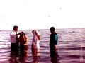 Primeros bautismos en puerto.jpg